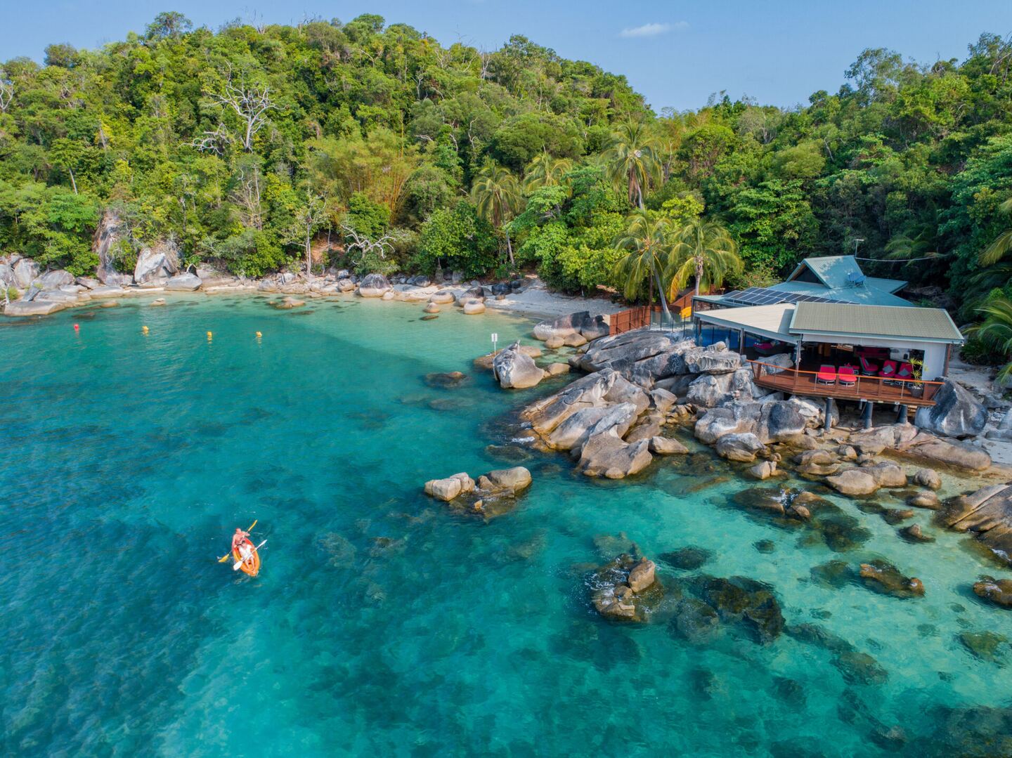 Aerial view of the cove and the retreat among rainforest